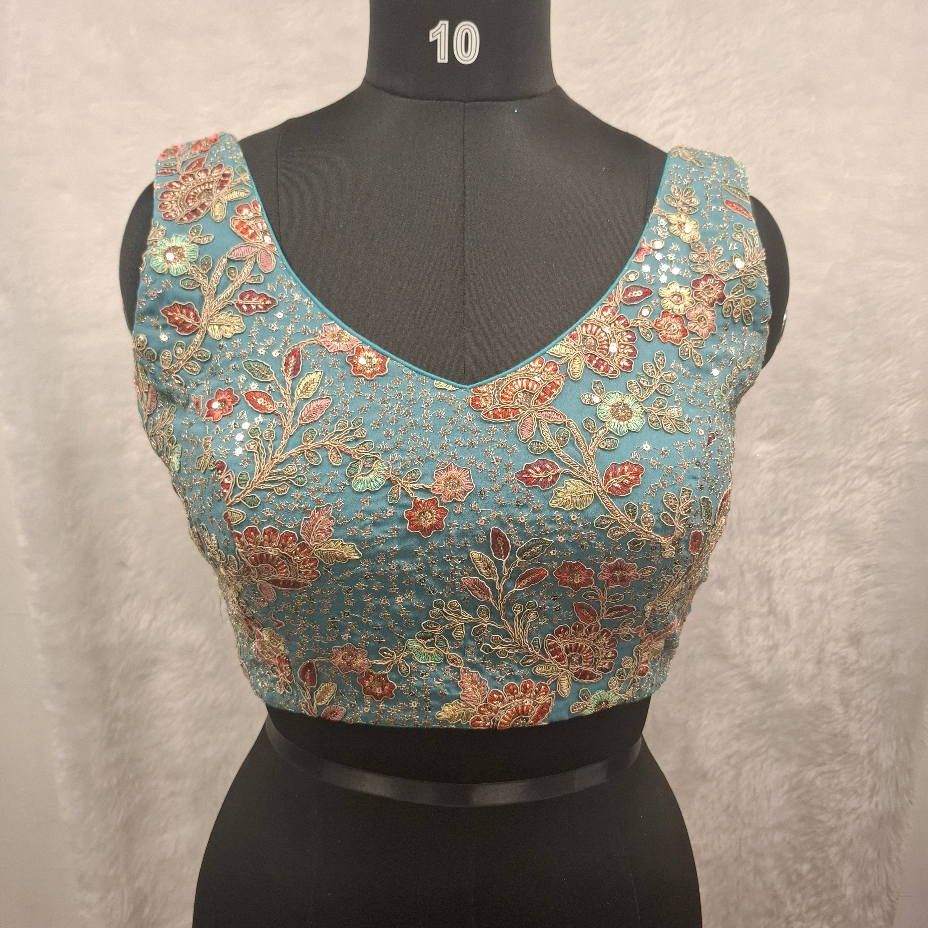 Kia Fashions Aqua Blue Georgette Multi Color Emb & Sqn Readymade Blouse