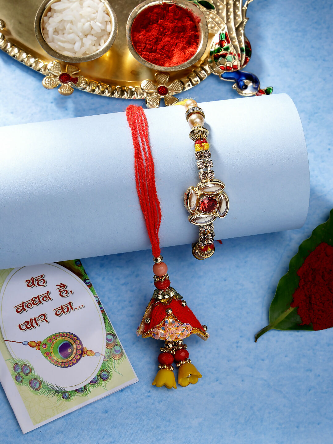 NVR Women & Men Set of 2 Red & Gold-Toned Stone-Studded Bhaiya Bhabhi Rakhi With Roli Chawal & Chocolate - Distacart