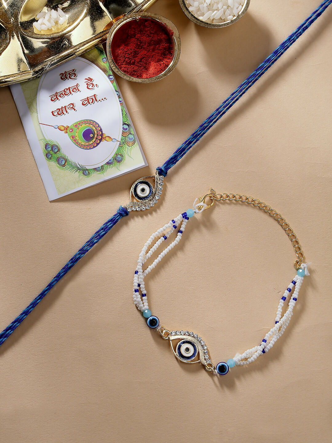NVR Women & Men Set of 2 Blue Evil Eye Bhaiya Bhabhi Rakhi Set With Roli Chawal - Distacart