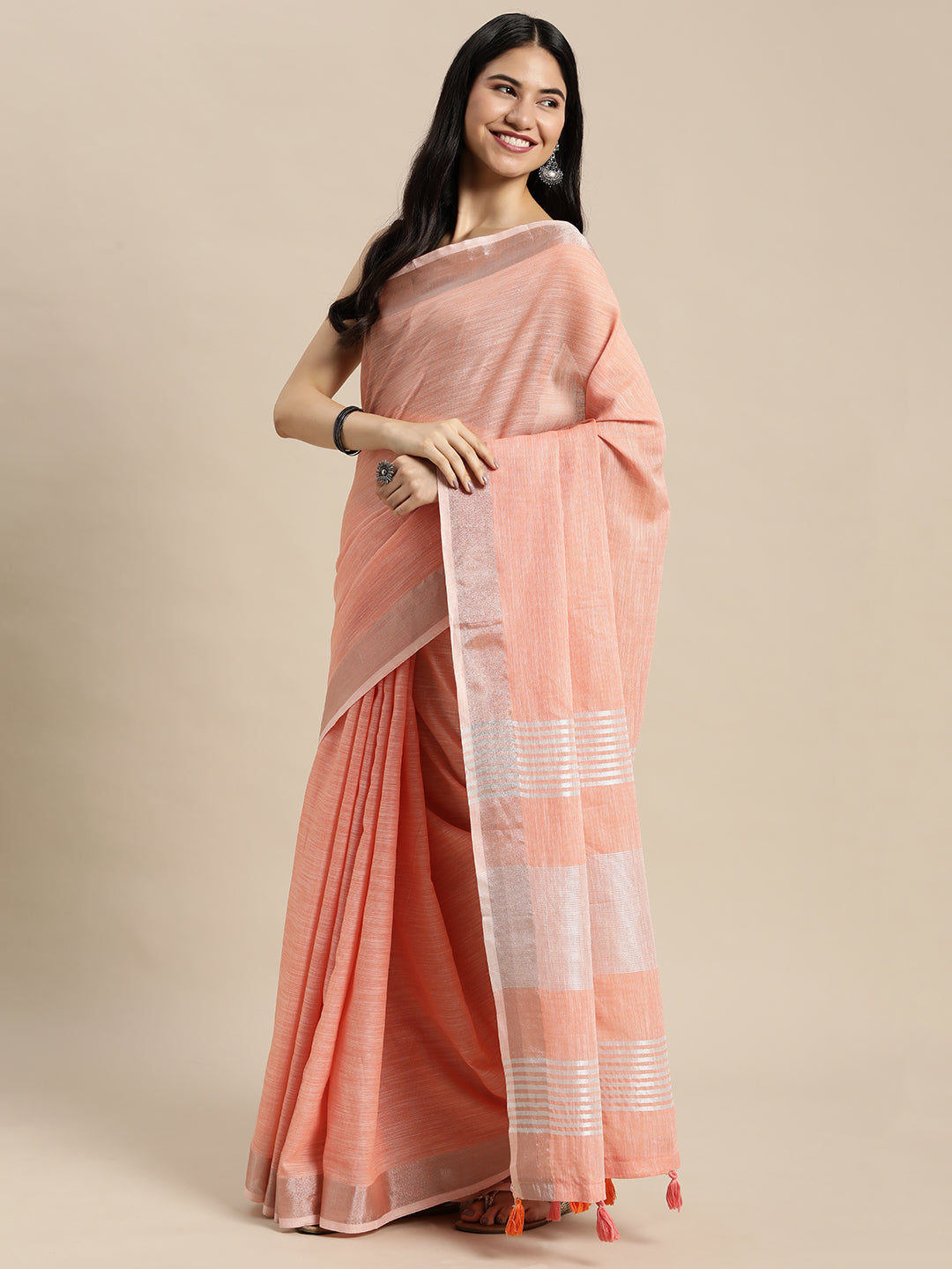 Astita Elegant Peach Woven Linen Saree with Contrast Zari Border & Tassels - Soft & Breathable Party Wear - Distacart