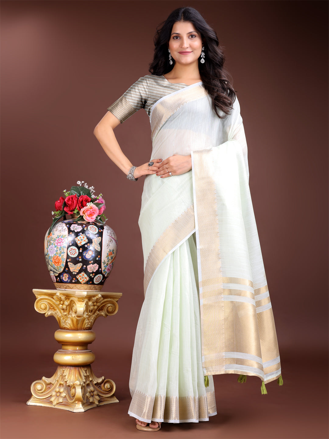 Astita Elegant Light Green Woven Linen Saree with Contrast Zari Border & Tassels - Soft & Breathable Party Wear - Distacart