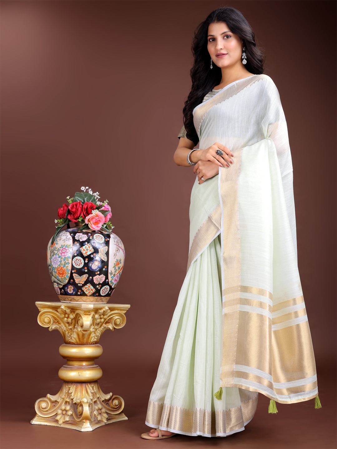 Astita Elegant Light Green Woven Linen Saree with Contrast Zari Border & Tassels - Soft & Breathable Party Wear - Distacart