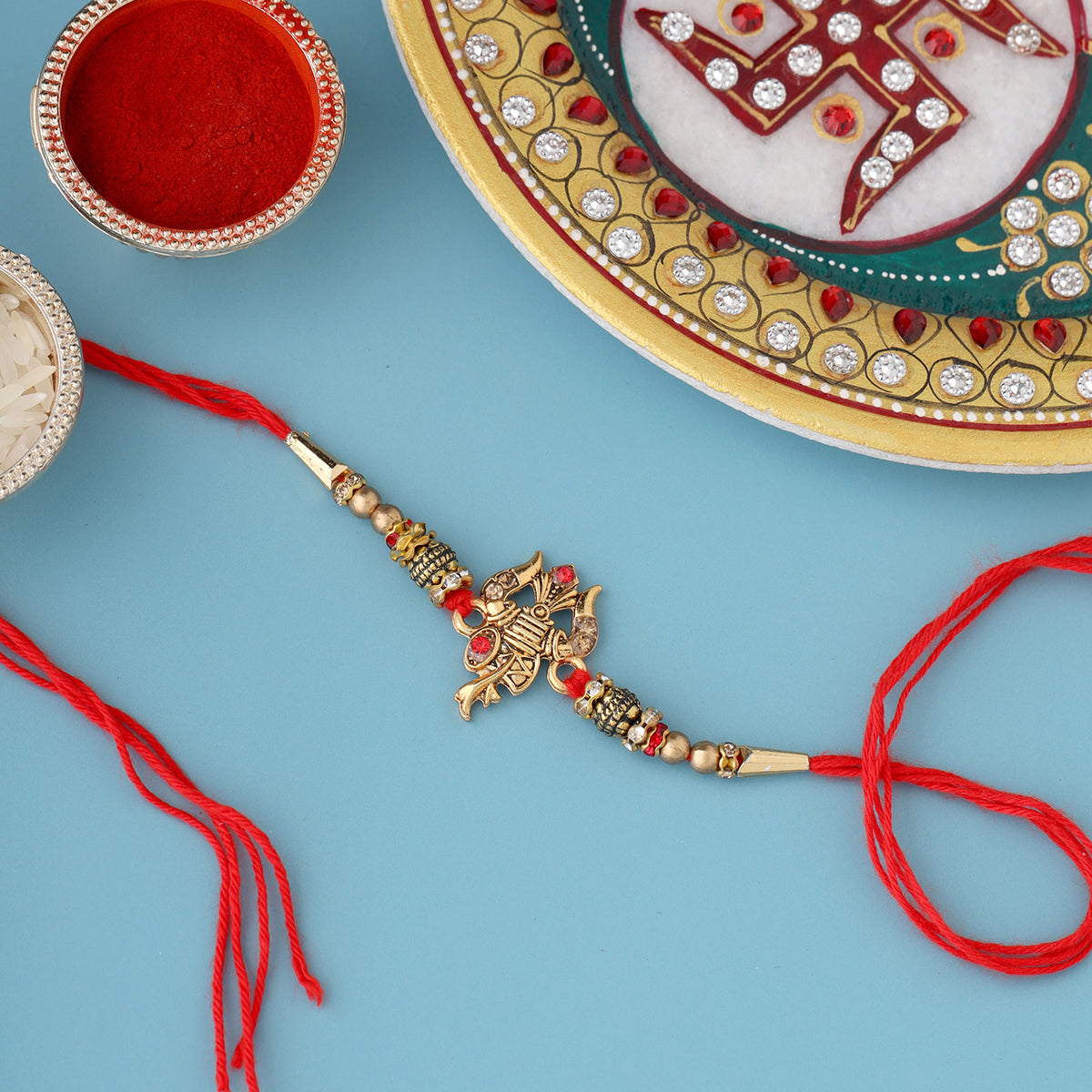 trueBrowns X Voylla Designer Ganesha Rakhi With Roli Chaawal Pack - Distacart