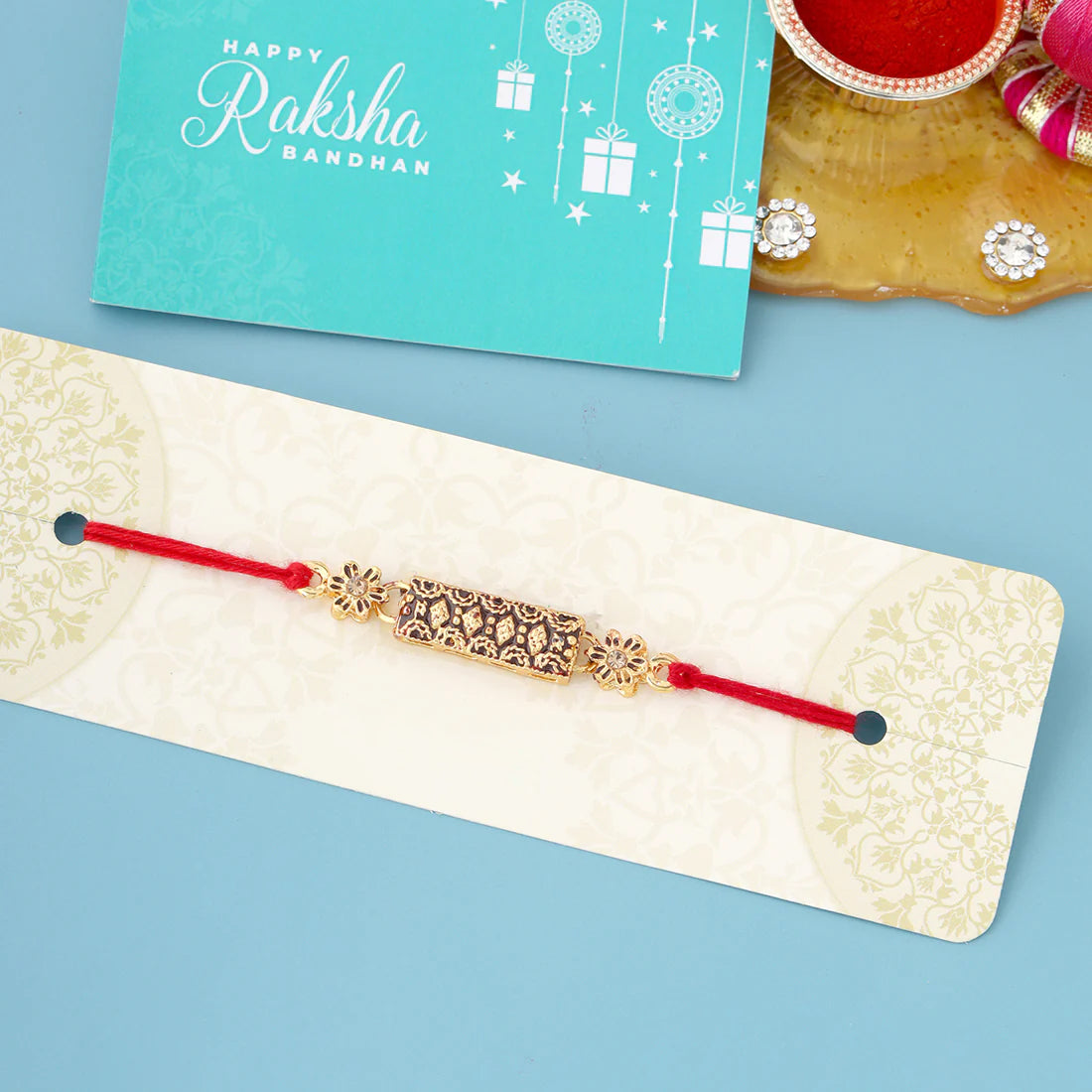 trueBrowns X Voylla Antique Floral Designer Rakhi With Roli Chaawal Pack