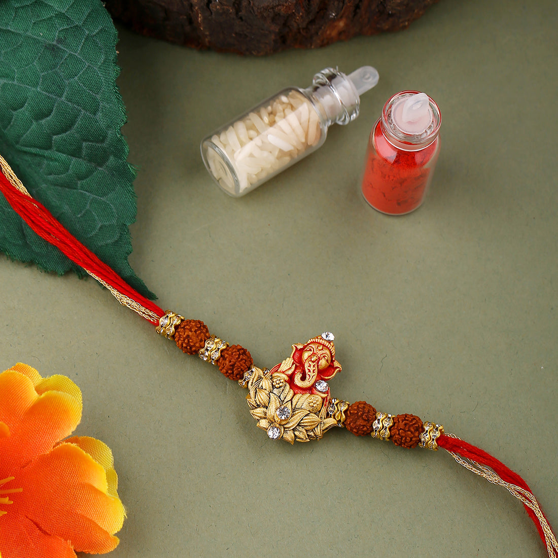 trueBrowns X Voylla Divine Rudraksha Ganesha Rakhi With Roli Chaawal Pack - Distacart