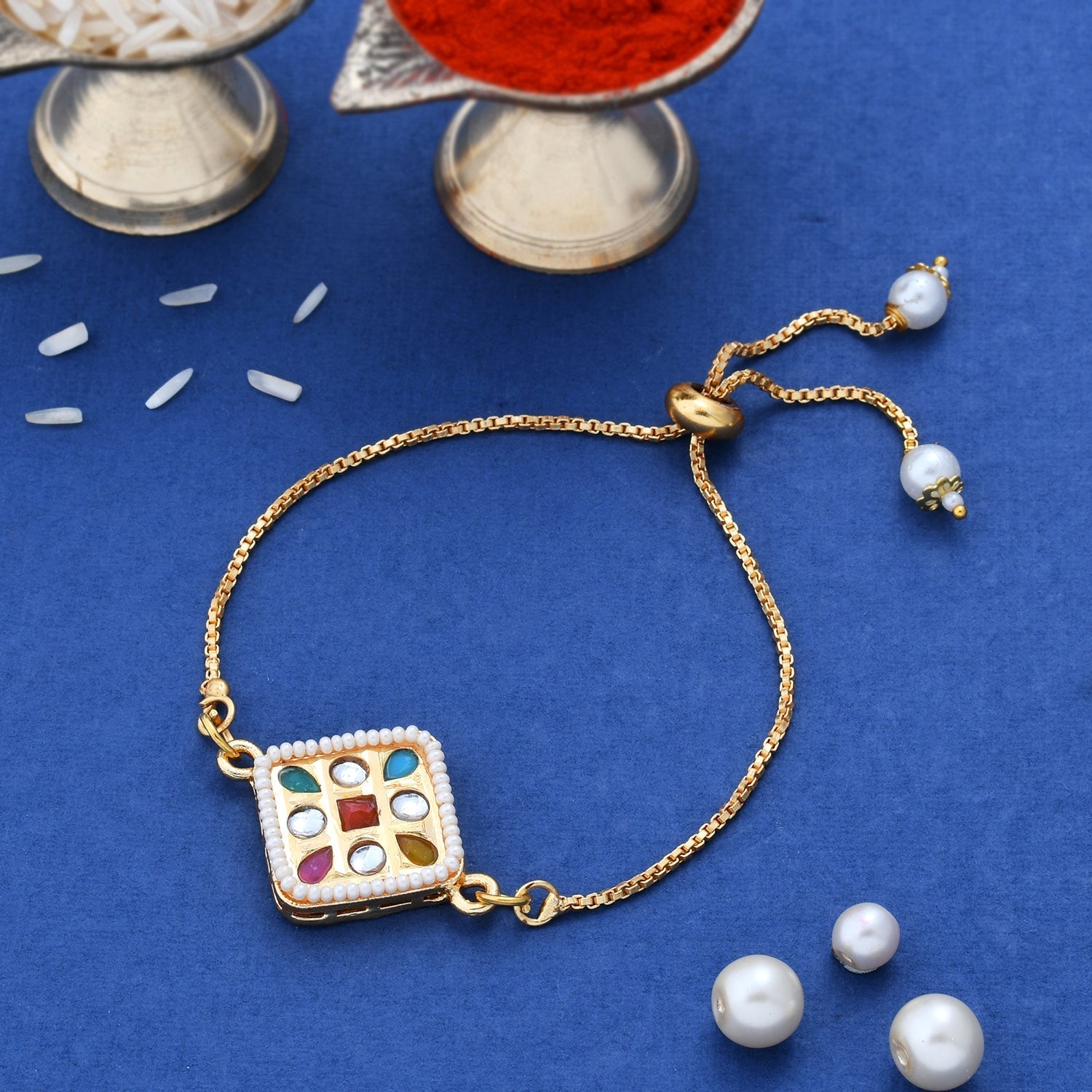 trueBrowns X Voylla CZ Embellished Gold Toned Bracelet Style Rakhi - Distacart