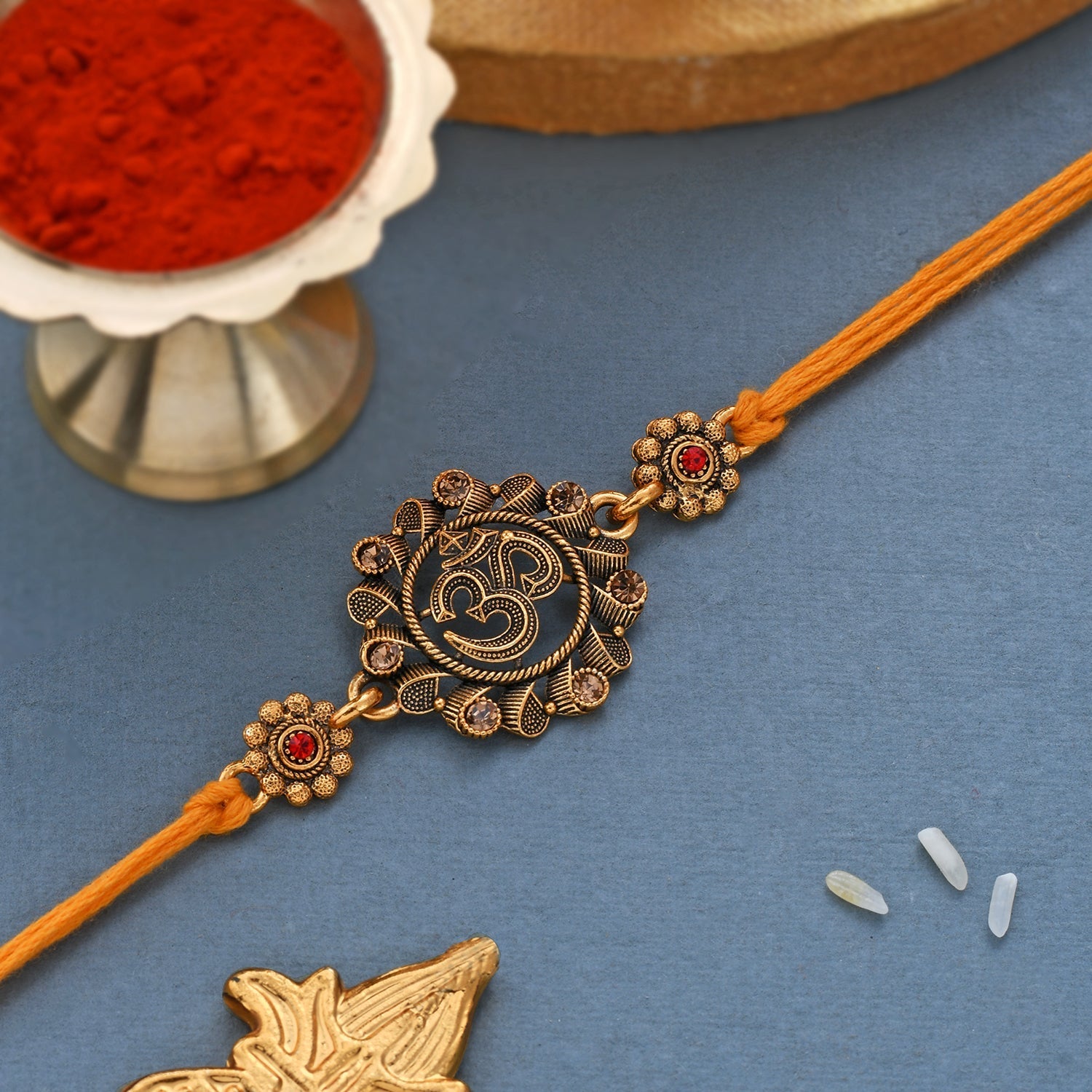 trueBrowns X Voylla Deity Inspired 'OM' Rakhi With Red Thread - Distacart
