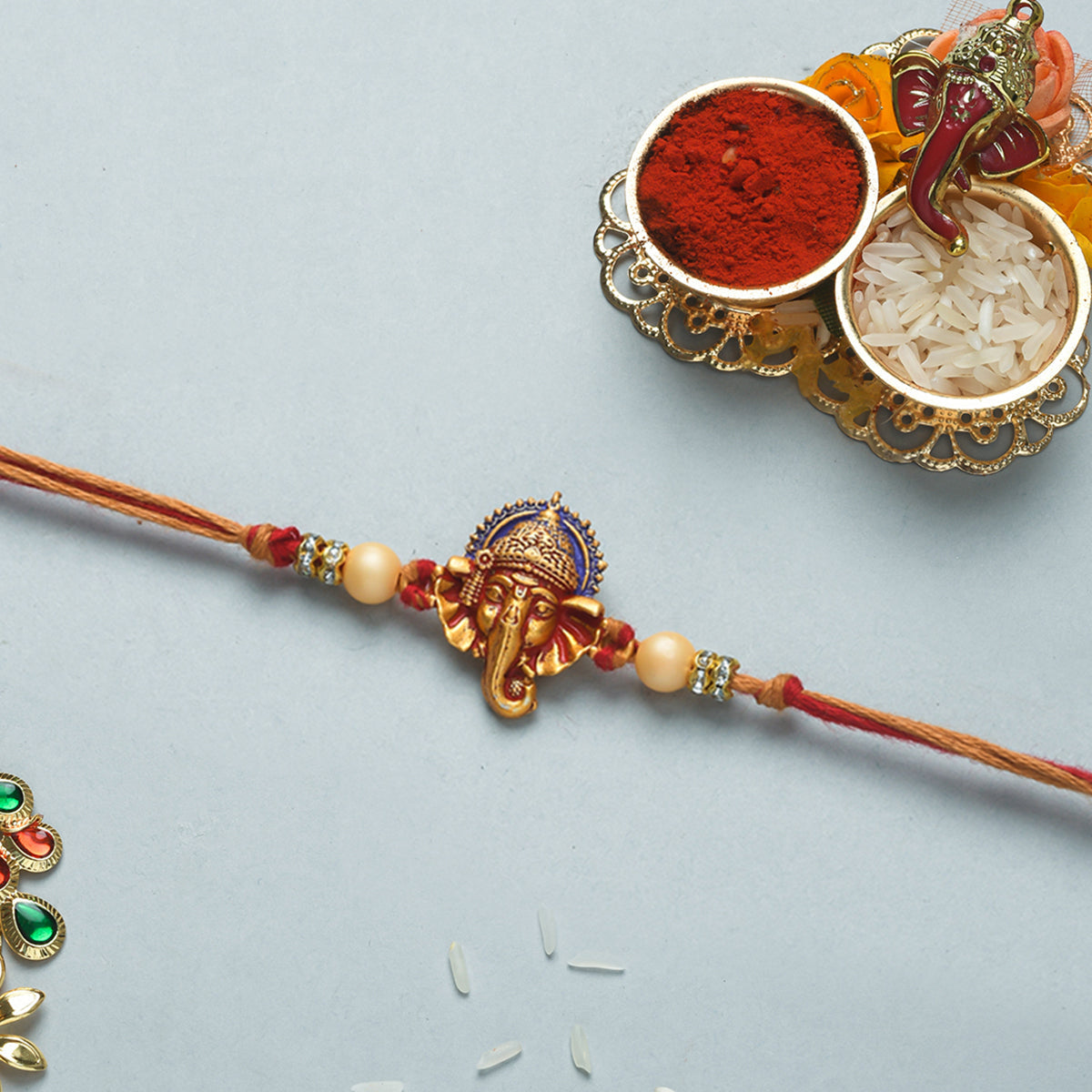 trueBrowns X Voylla Deity Inspired CZ Embellished Ganpati Rakhi - Distacart