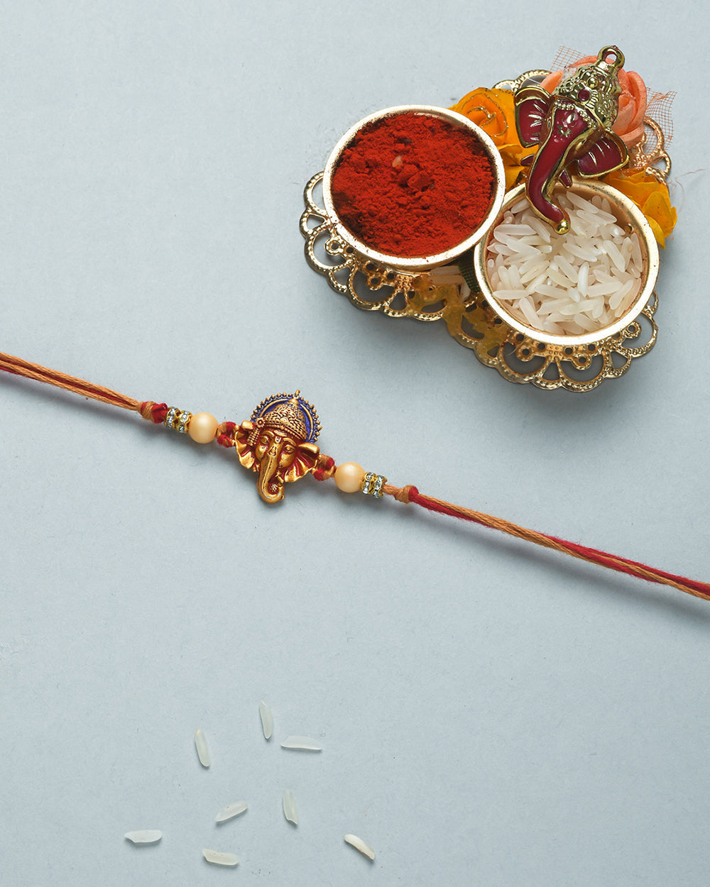 trueBrowns X Voylla Deity Inspired CZ Embellished Ganpati Rakhi - Distacart