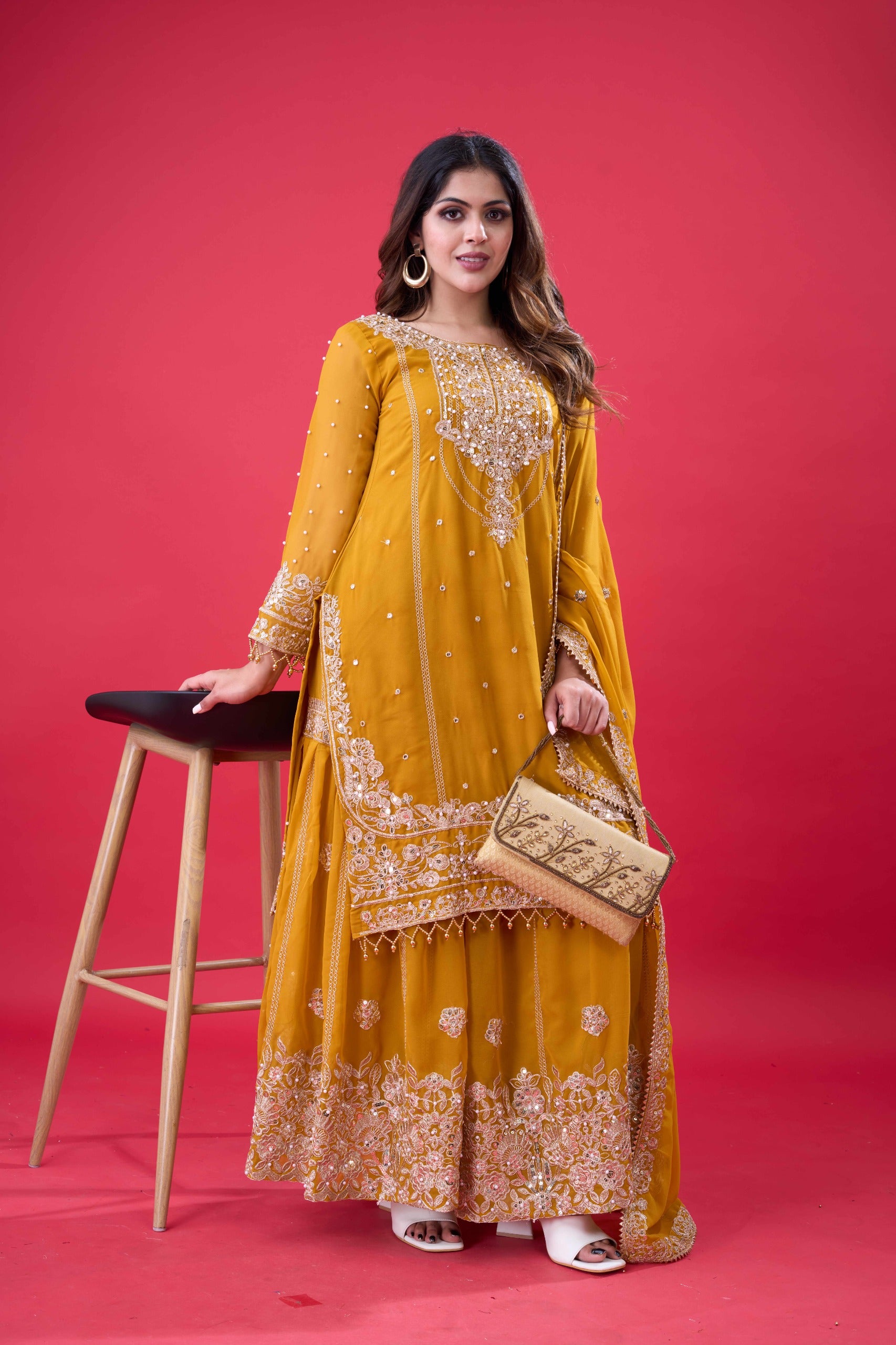 Prazu Fashion Yellow Georgette Embroidered Rivet Moti Work Palazzo Suit