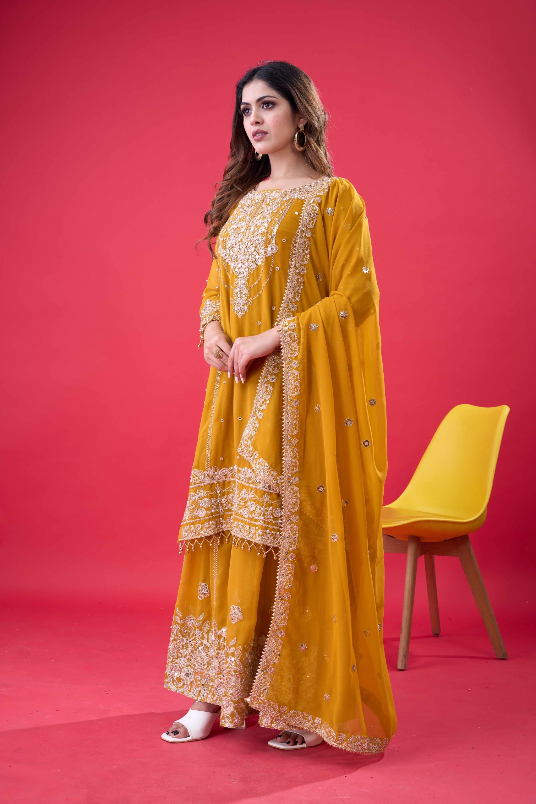 Prazu Fashion Yellow Georgette Embroidered Rivet Moti Work Palazzo Suit
