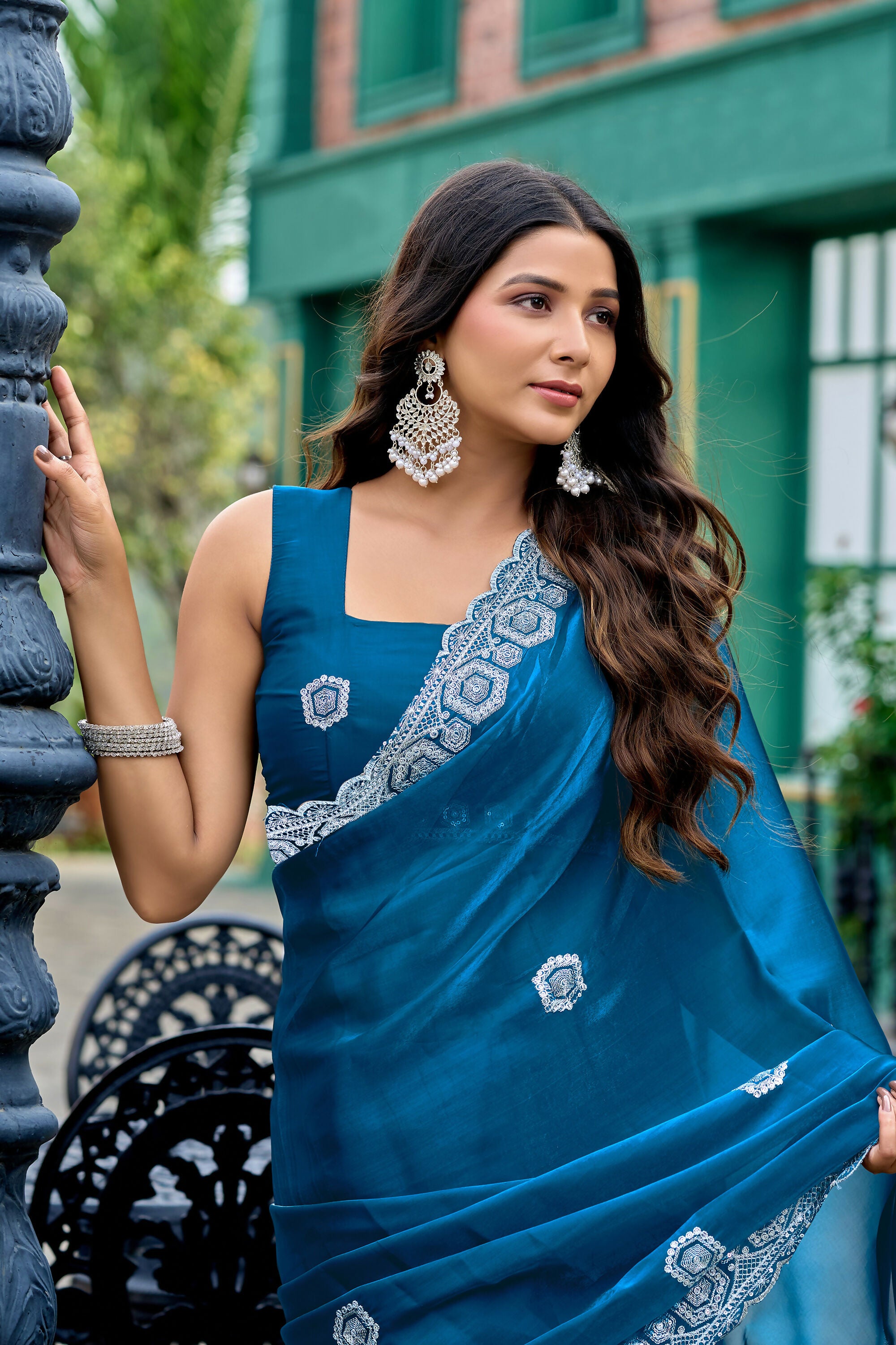 Vastranavya Teal Embroidery Work Shimmer Chiffon Saree with Unstitched Blouse