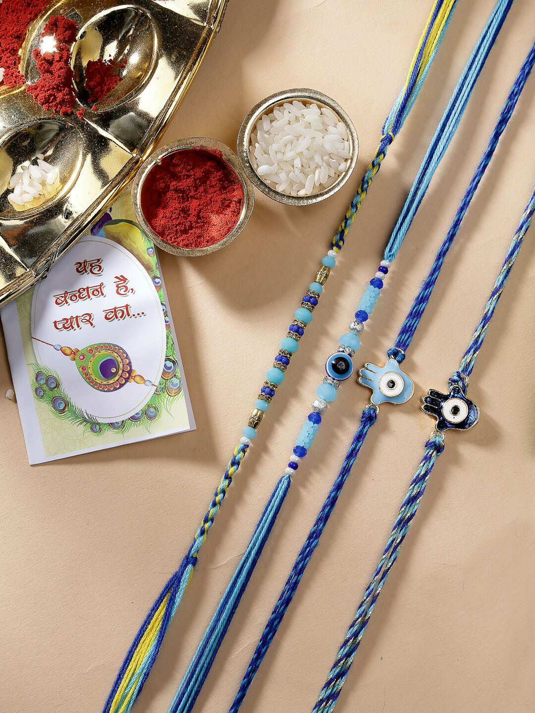 NVR Women & Men Set of 4 Blue Evil Eye Charm Rakhi With Roli Chawal - Distacart