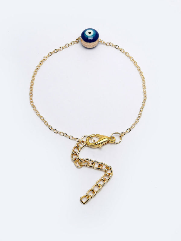 NVR Women Gold-Toned Evil Eye Rakhi With Roli Chawal - Distacart