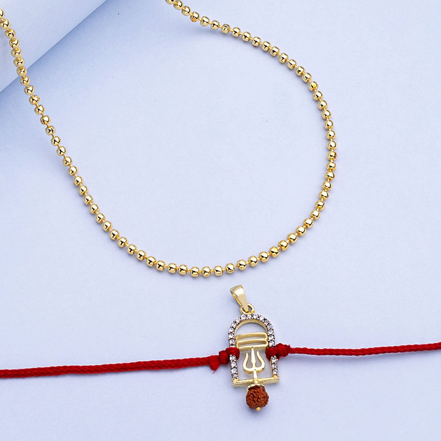 trueBrowns X Voylla CZ Studded Trushul Rakhi-Pendant - Distacart