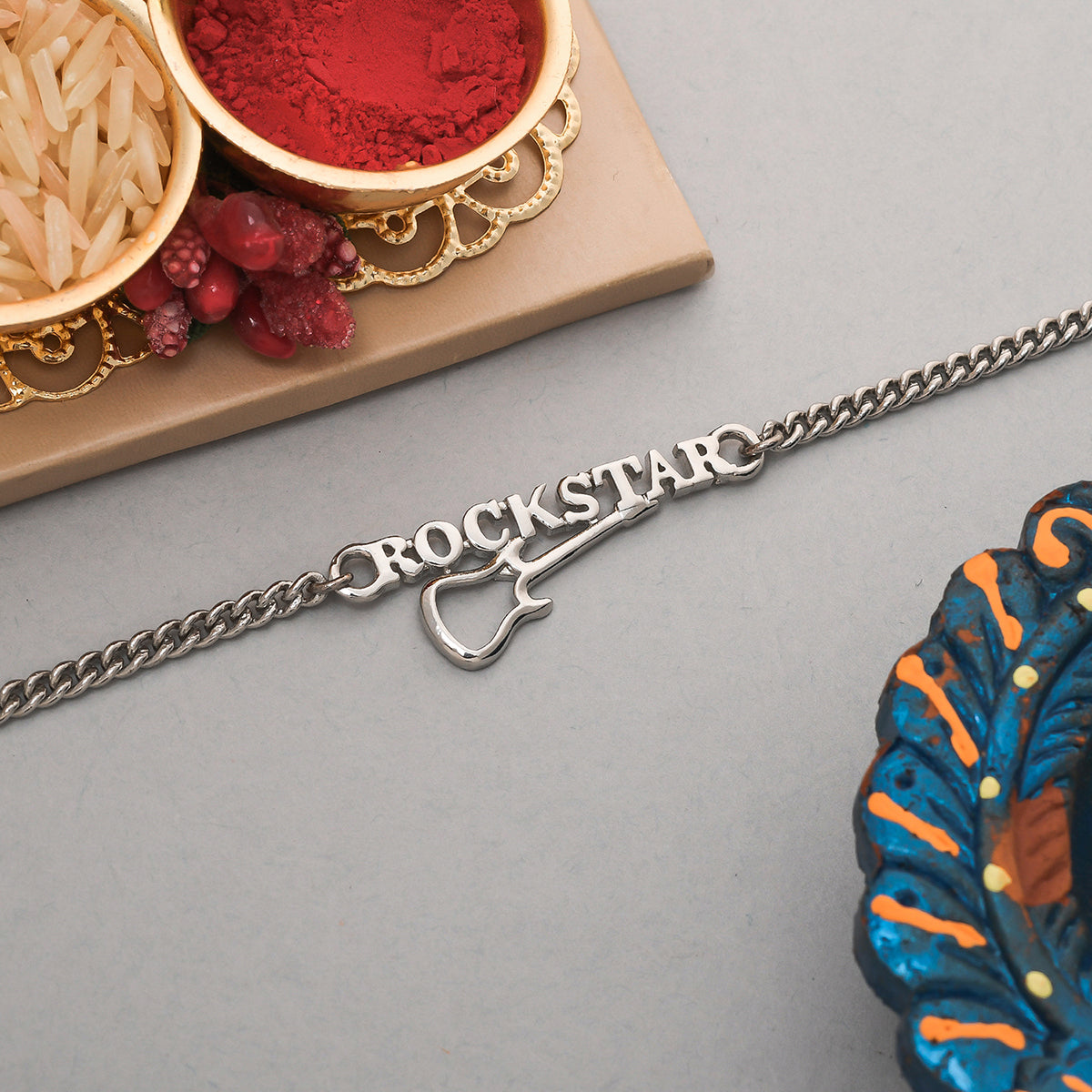 trueBrowns Stylish ROCKSTAR Silver Tone Bracelet Rakhi - Distacart