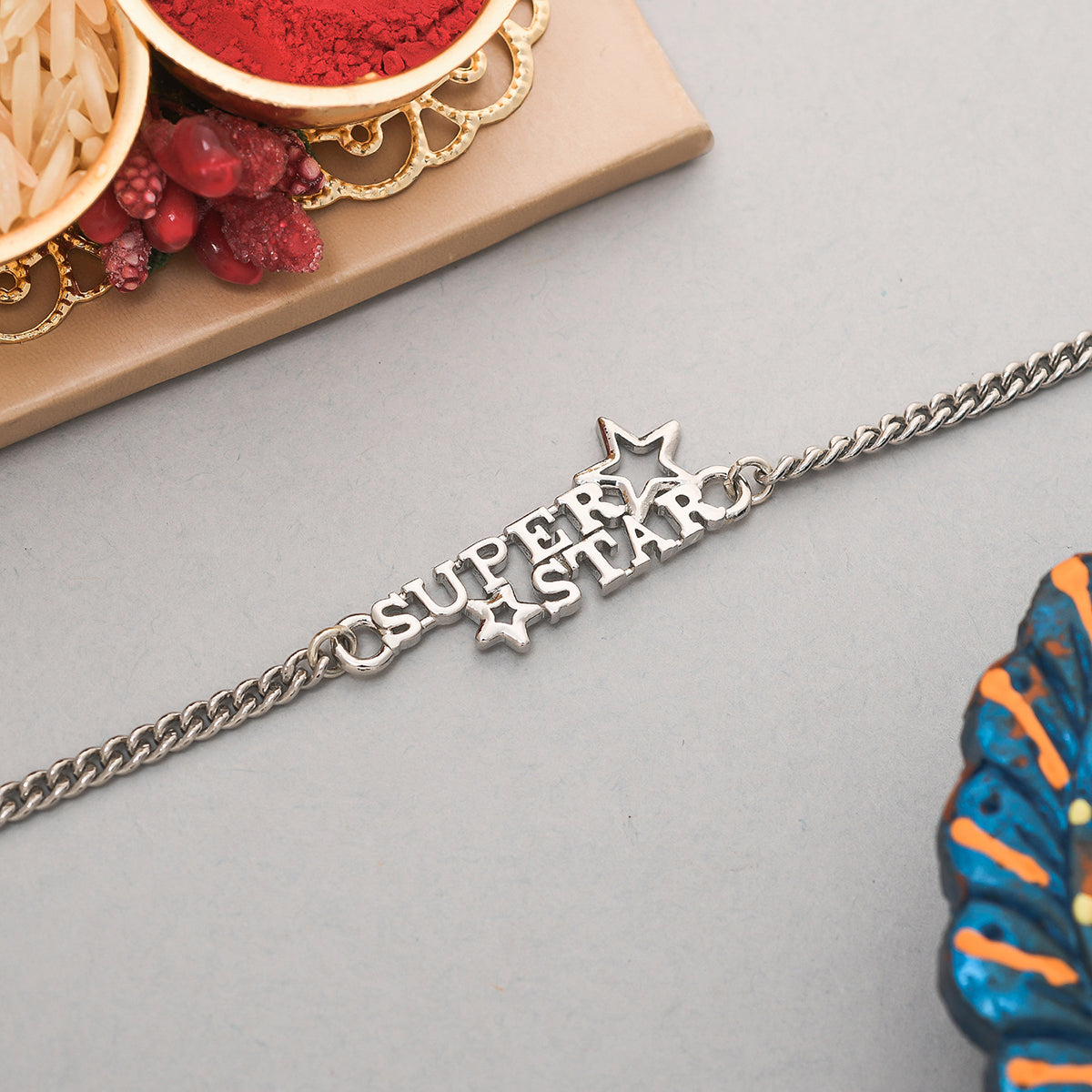 trueBrowns X Voylla Stylish Silver Plated Super Star Bracelet Rakhi - Distacart