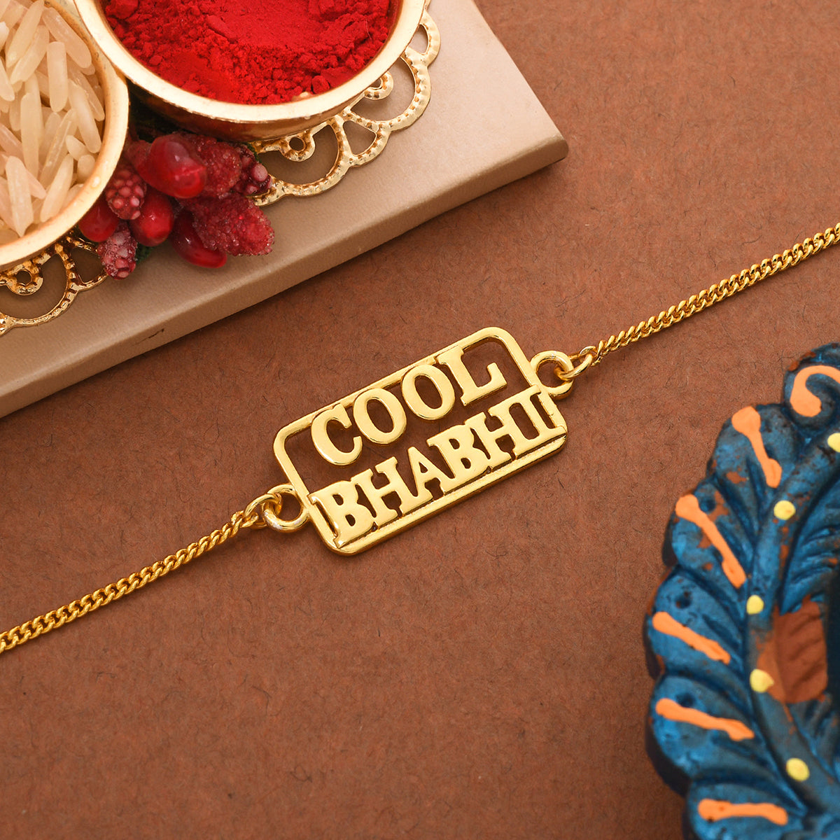 trueBrowns Stylish Gold-Polished Cool Bhabhi Bracelet Rakhi - Distacart