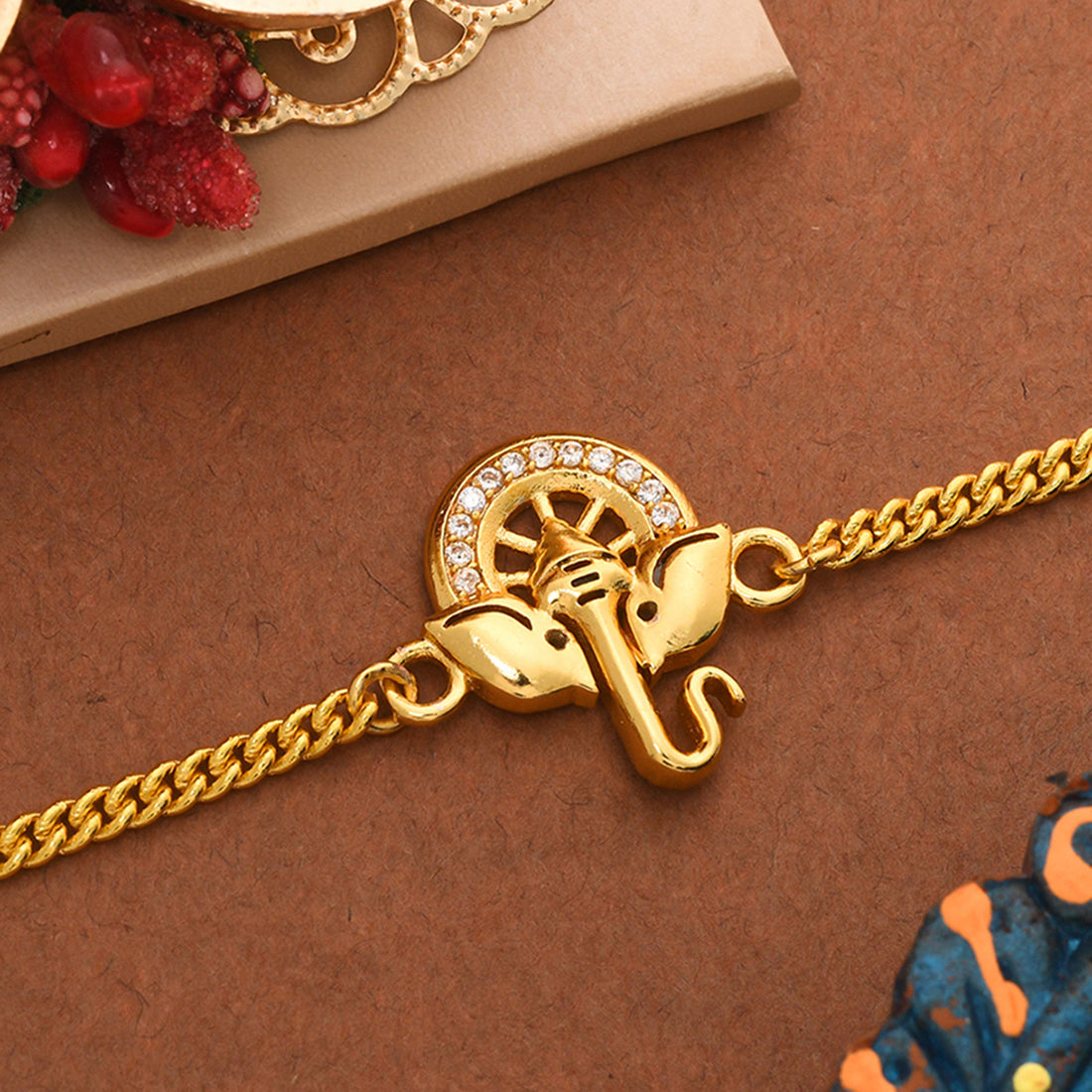trueBrowns Gold Tone Ganesha Bracelet Style Rakhi - Distacart