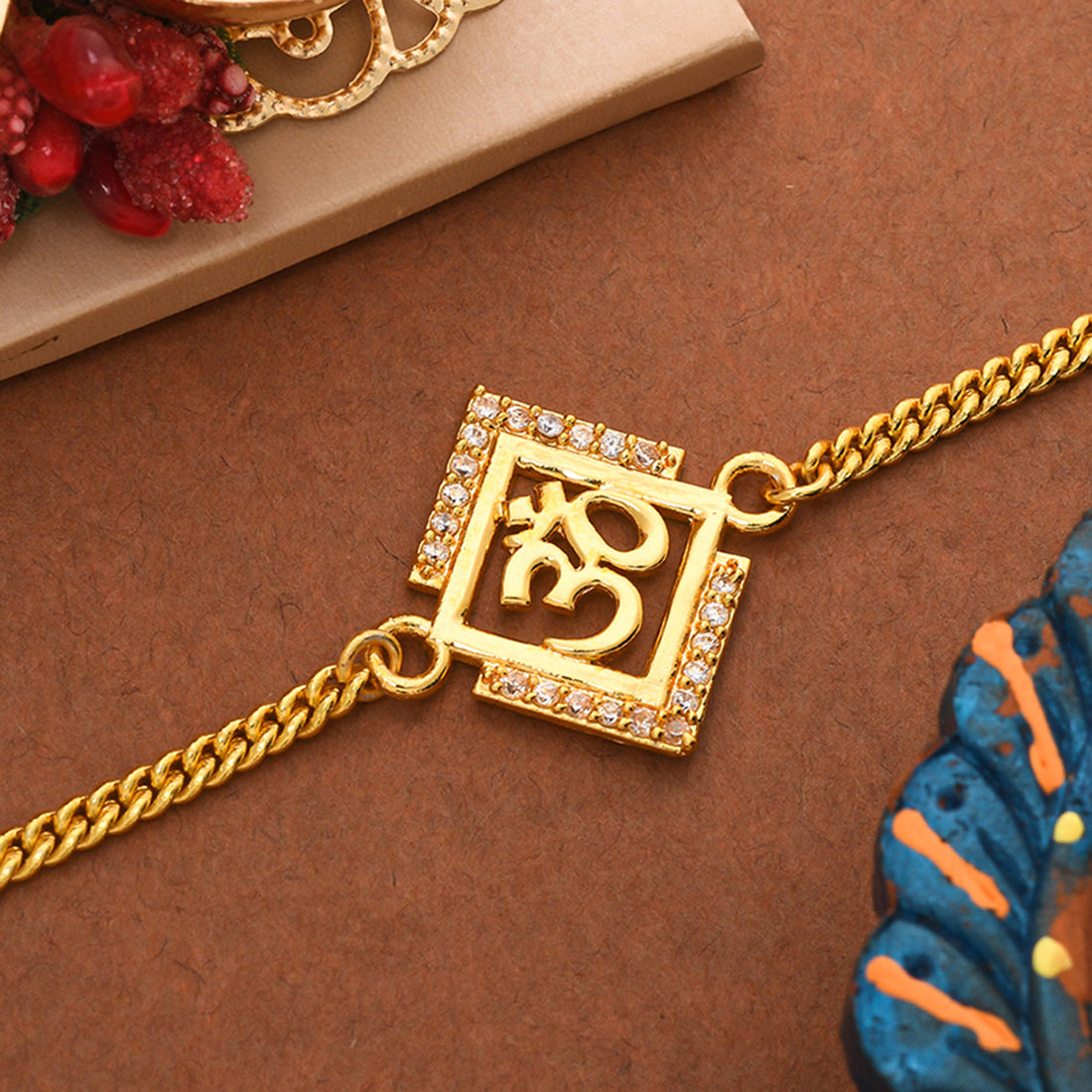 trueBrowns Gold Tone Auspicious OM Bracelet Rakhi - Distacart