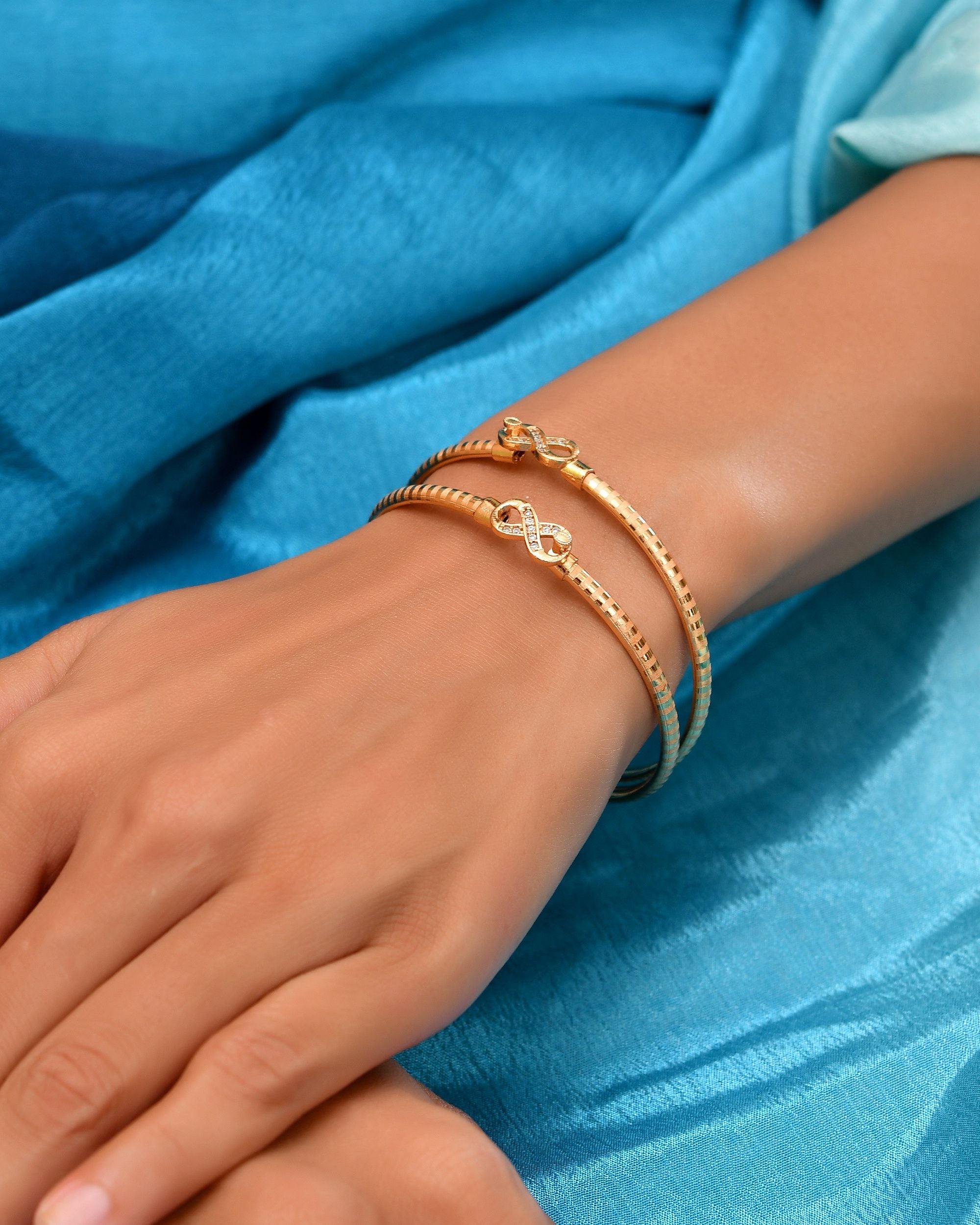 VOJ Set Of 2 Gold Polished AD Studded Infinite Shaped Bangles - Dista