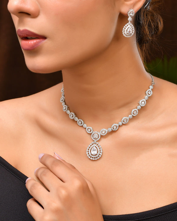 VOJ Silver Plated AD Stone Studded Elegant Necklace And Earrings Set