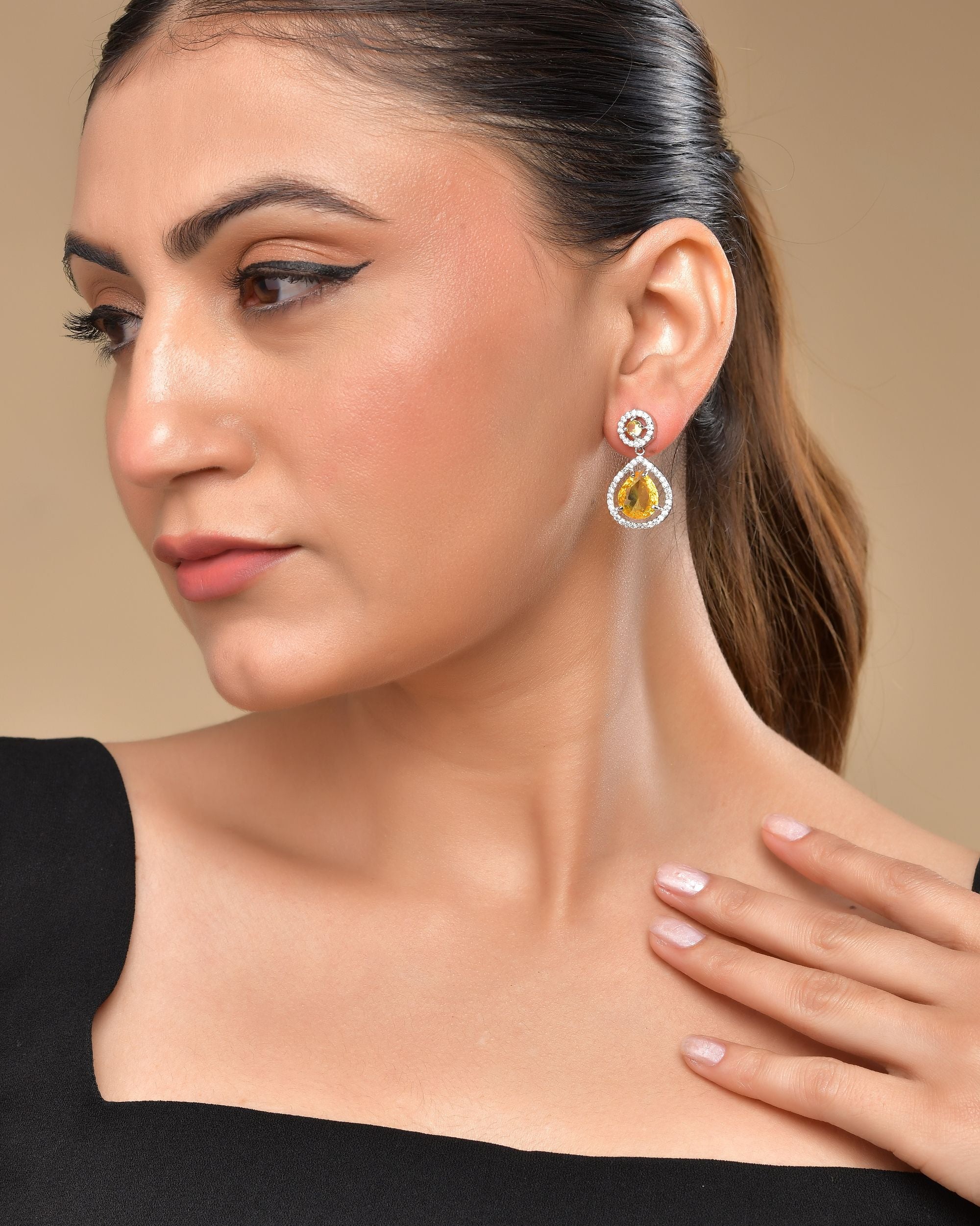 VOJ Silver Plated Yellow Stone Studded Teardrop Shaped Earrings