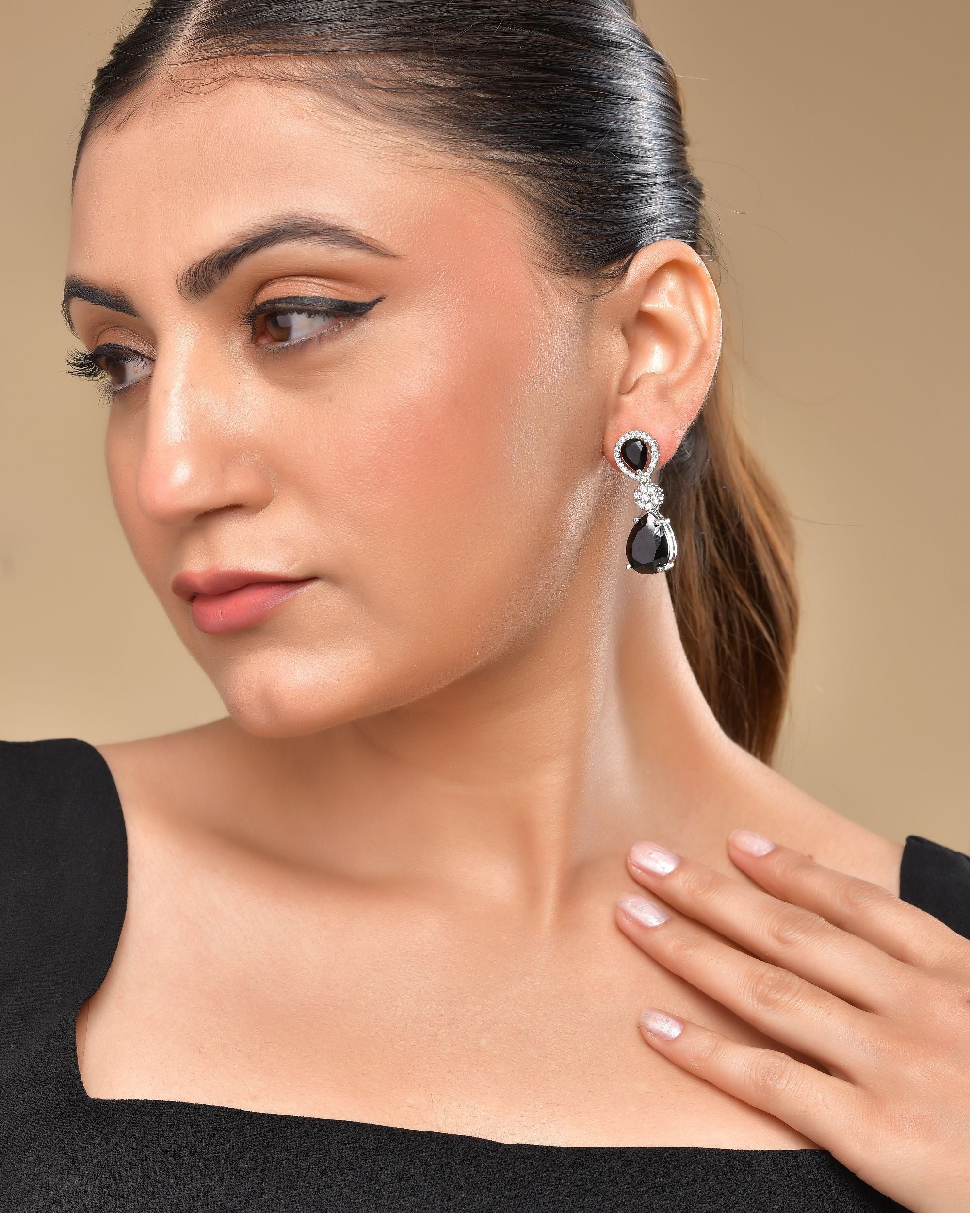 VOJ Silver Plated Black Stone Studded Floral Shaped Studs Earrings