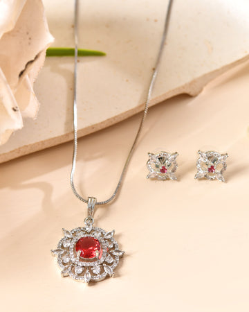VOJ Silver Plated Ruby Red Circular Stone Studded Sun Shaped Ad Pendant With Chain Set - Dista