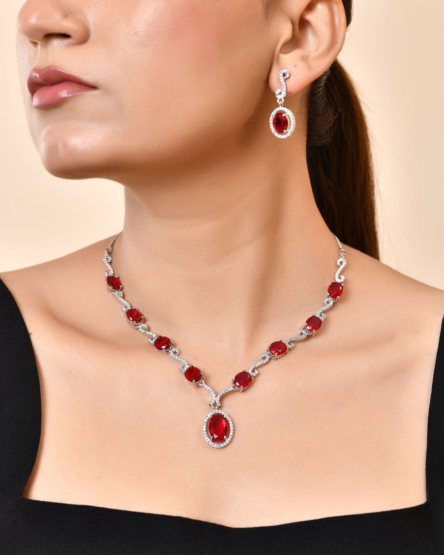 VOJ Silver Plated Oval Ruby Red Stone Studded Ad Jewellery Set - Dista