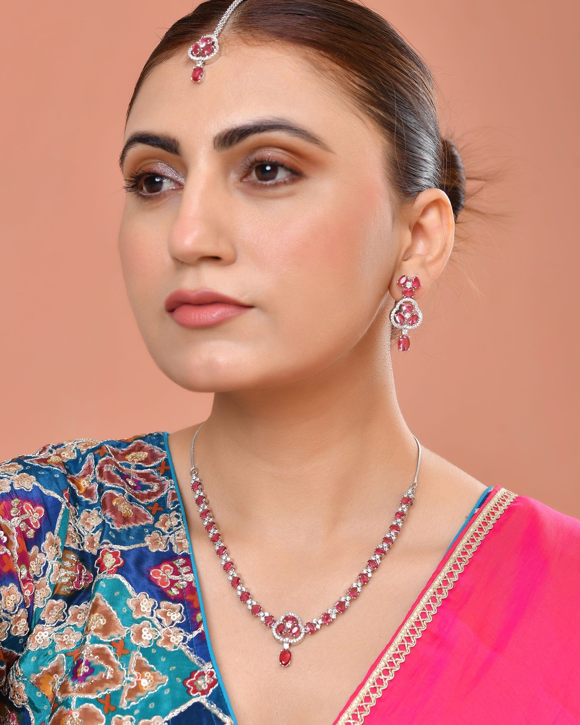 VOJ Silver Plated Ruby Red Stone Studded Ad Jewellery Set With Maang Tikka - Dista