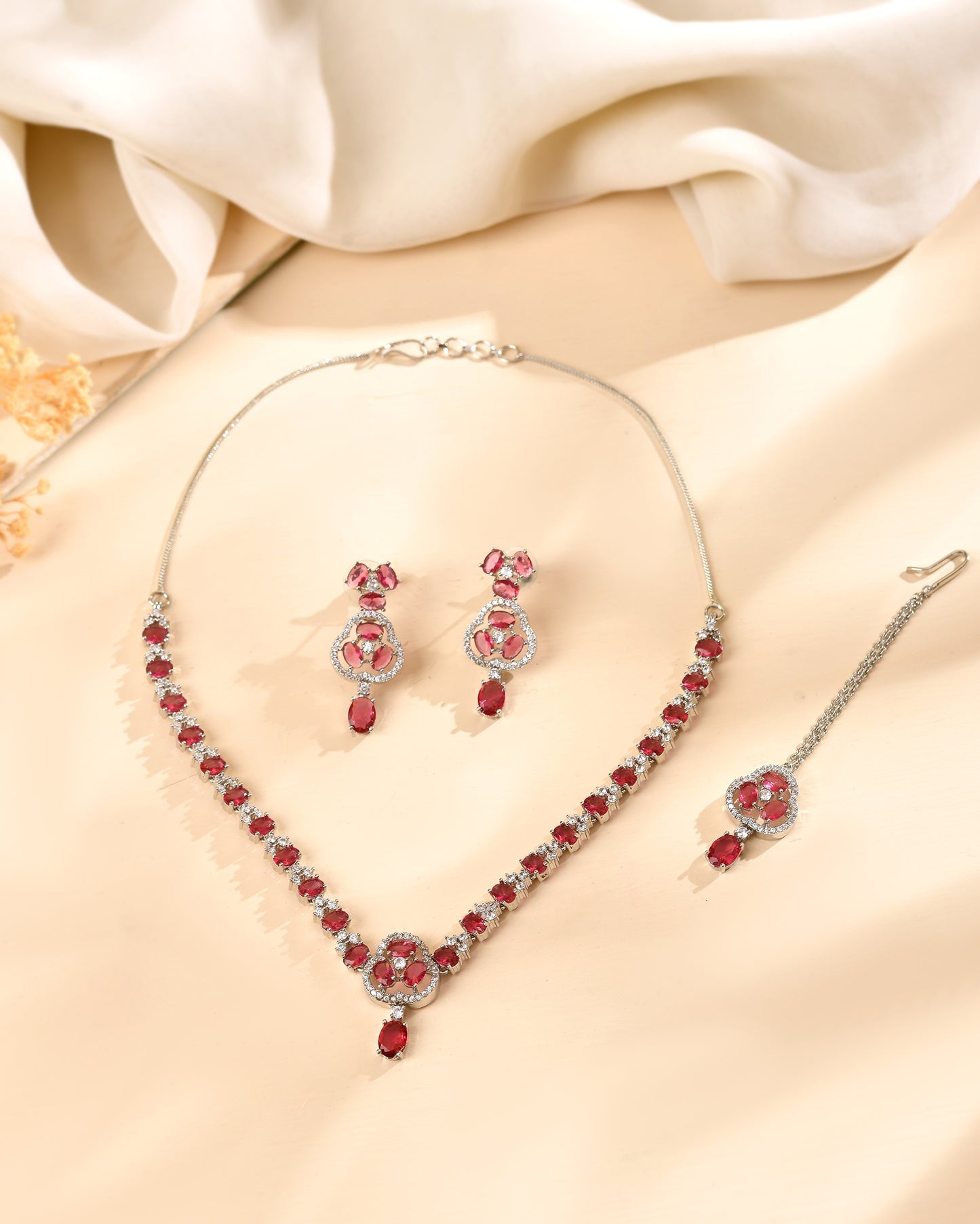 VOJ Silver Plated Ruby Red Stone Studded Ad Jewellery Set With Maang Tikka - Dista