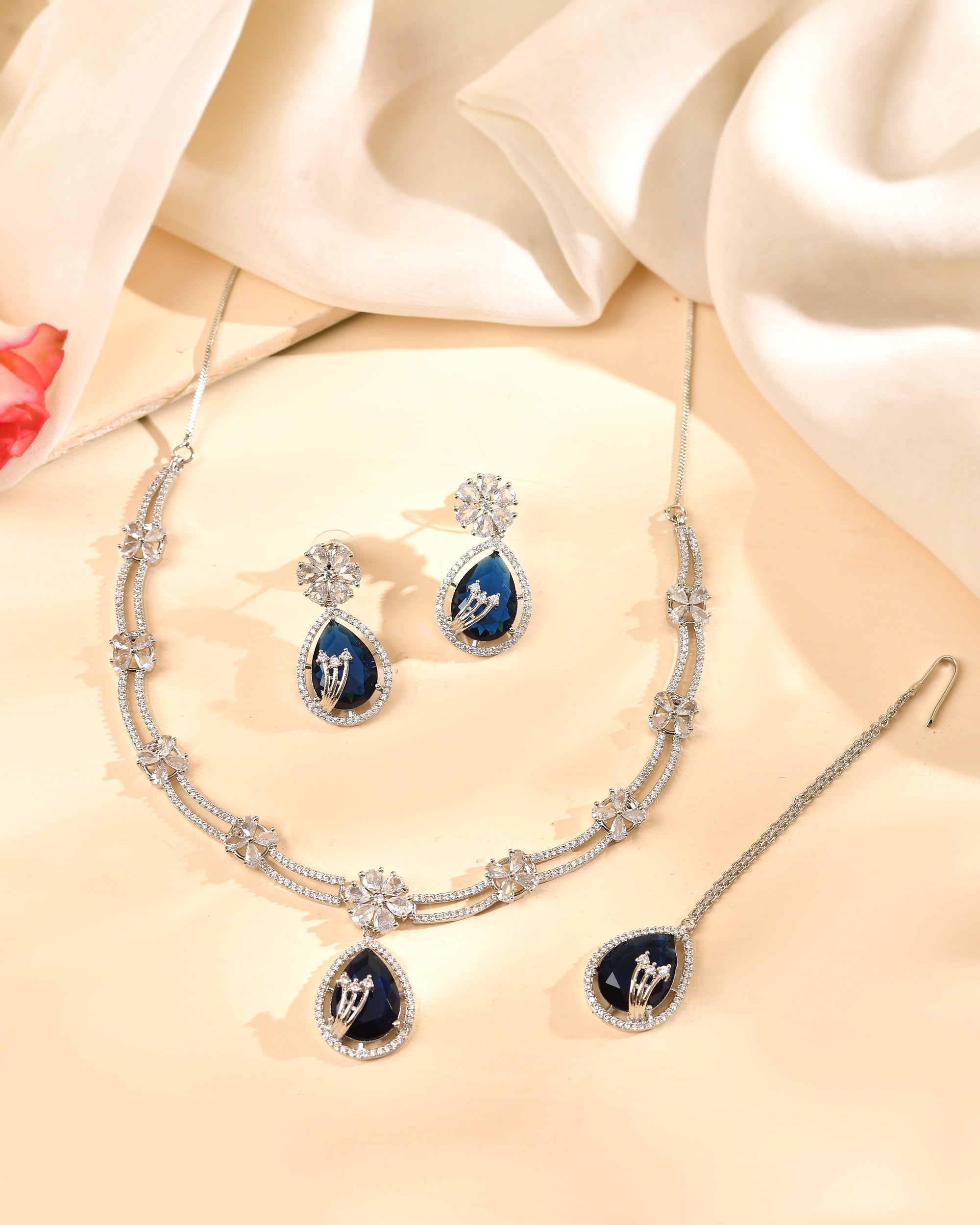 VOJ Silver Plated Blue Tear Drop Shaped Stone And Ad Stone Jewellery Set With Maang Tikka