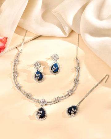 VOJ Silver Plated Blue Tear Drop Shaped Stone And Ad Stone Jewellery Set With Maang Tikka - Dista