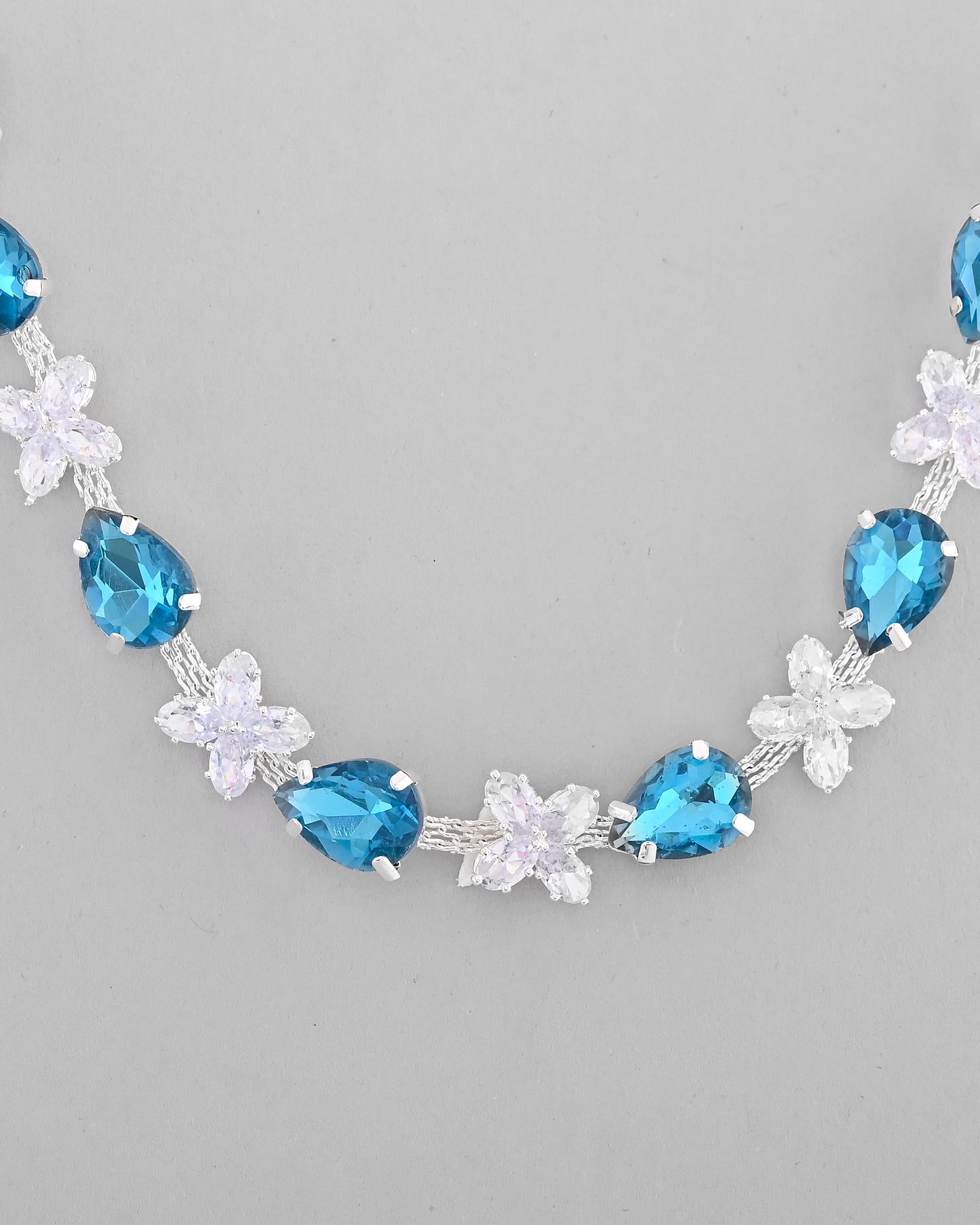 VOJ Silver Plated Blue And White Stone Studded Necklace with Earrings Set - Distacart