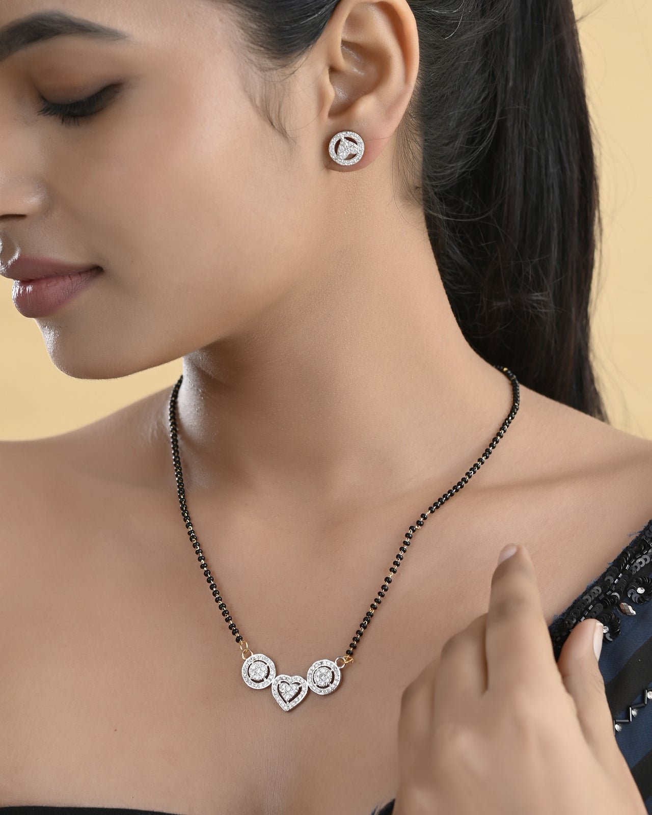 VOJ Gold Toned AD Stone Studded Heart Shape MangalSutra Set