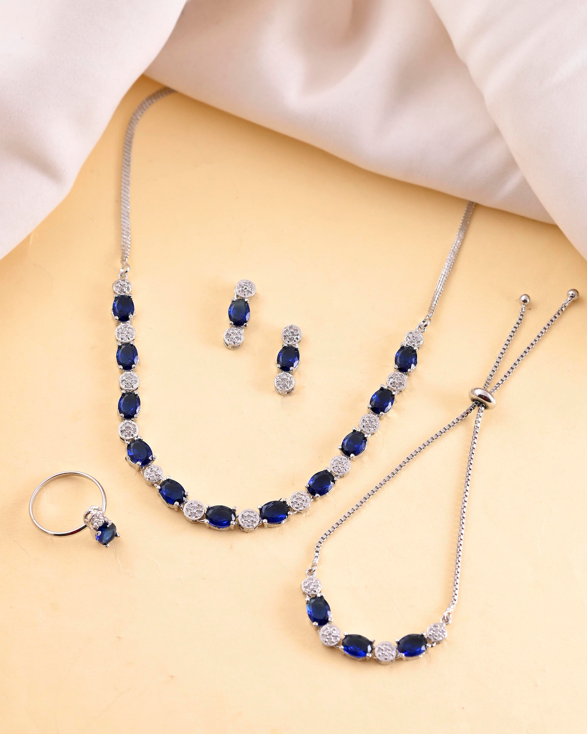 VOJ Silver Plated Blue Stone Studded Necklace Set With Ring And bracelet - Distacart