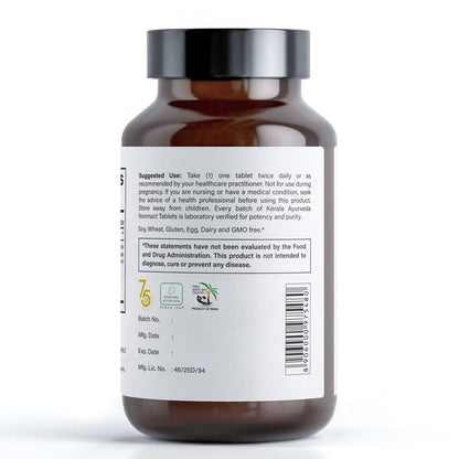 A bottle of Kerala Ayurveda Vital Flow, an ayurvedic oil which contains 90 tablets for dietary supplement, with a back label of how to use instruction
