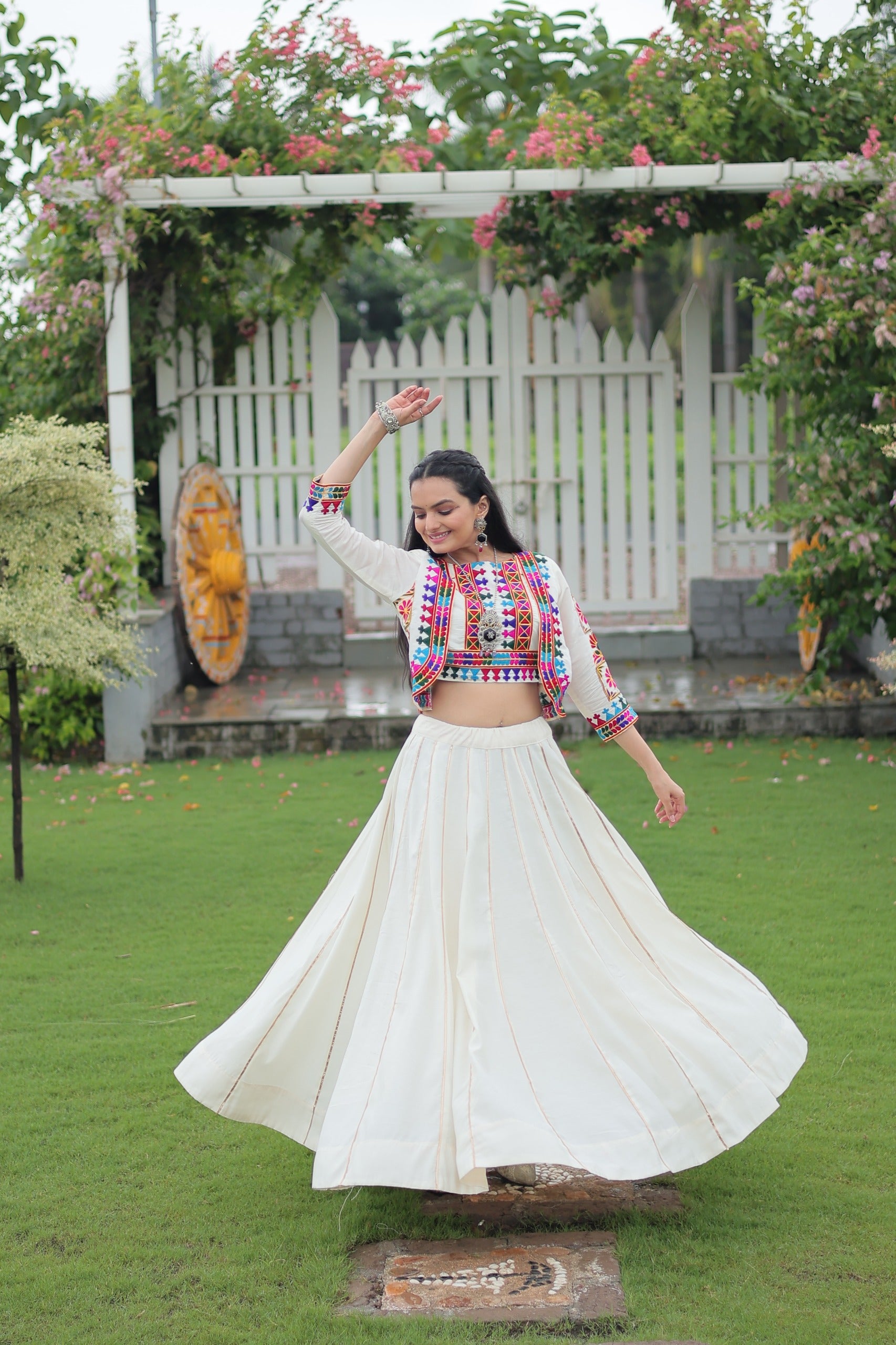 Evanik Navratri Off White Roamn Fabric With Kutchi Work Koti Style Blouse Stitched Lehenga Choli