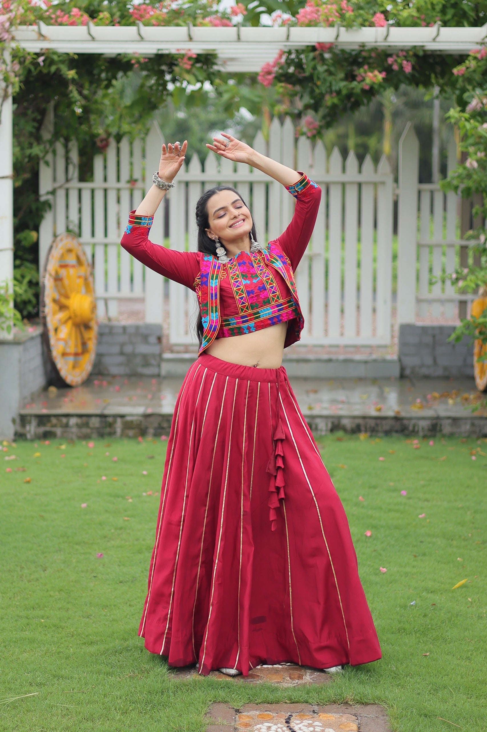 Evanik Navratri Maroon Roamn Fabric With Kutchi Work Koti Style Blouse Stitched Lehenga Choli