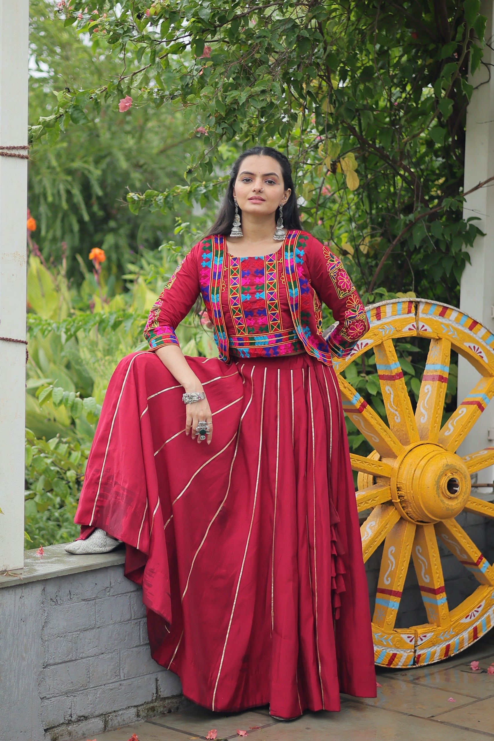Evanik Navratri Maroon Roamn Fabric With Kutchi Work Koti Style Blouse Stitched Lehenga Choli