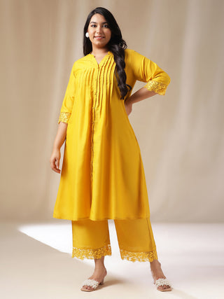Janasya Pleated Muslin Yellow Solid Band Collar Kurta Set - Distacart