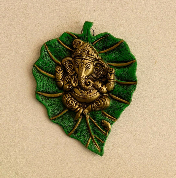 eCraftIndia Metal Golden Lord Ganesha On Green Leaf Wall Hanging Sculpture - Distacart