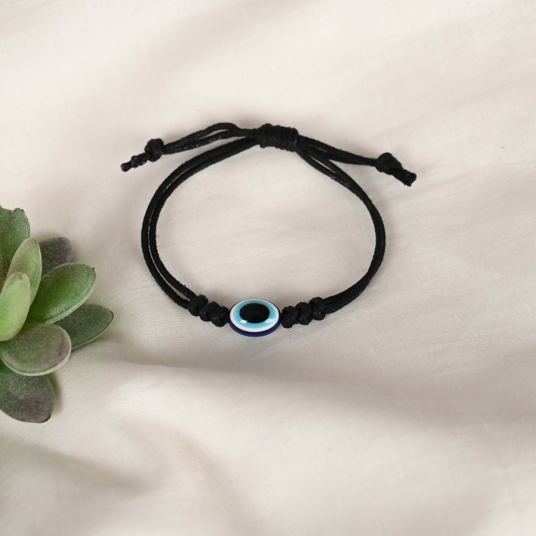 NVR Women & Men Black Evil Eye Rakhi With Roli Chawal - Distacart