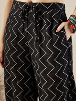 Thumbnail for Indo Era Black Floral Printed V-Neck Sequinned A-Line Kurta With Salwar