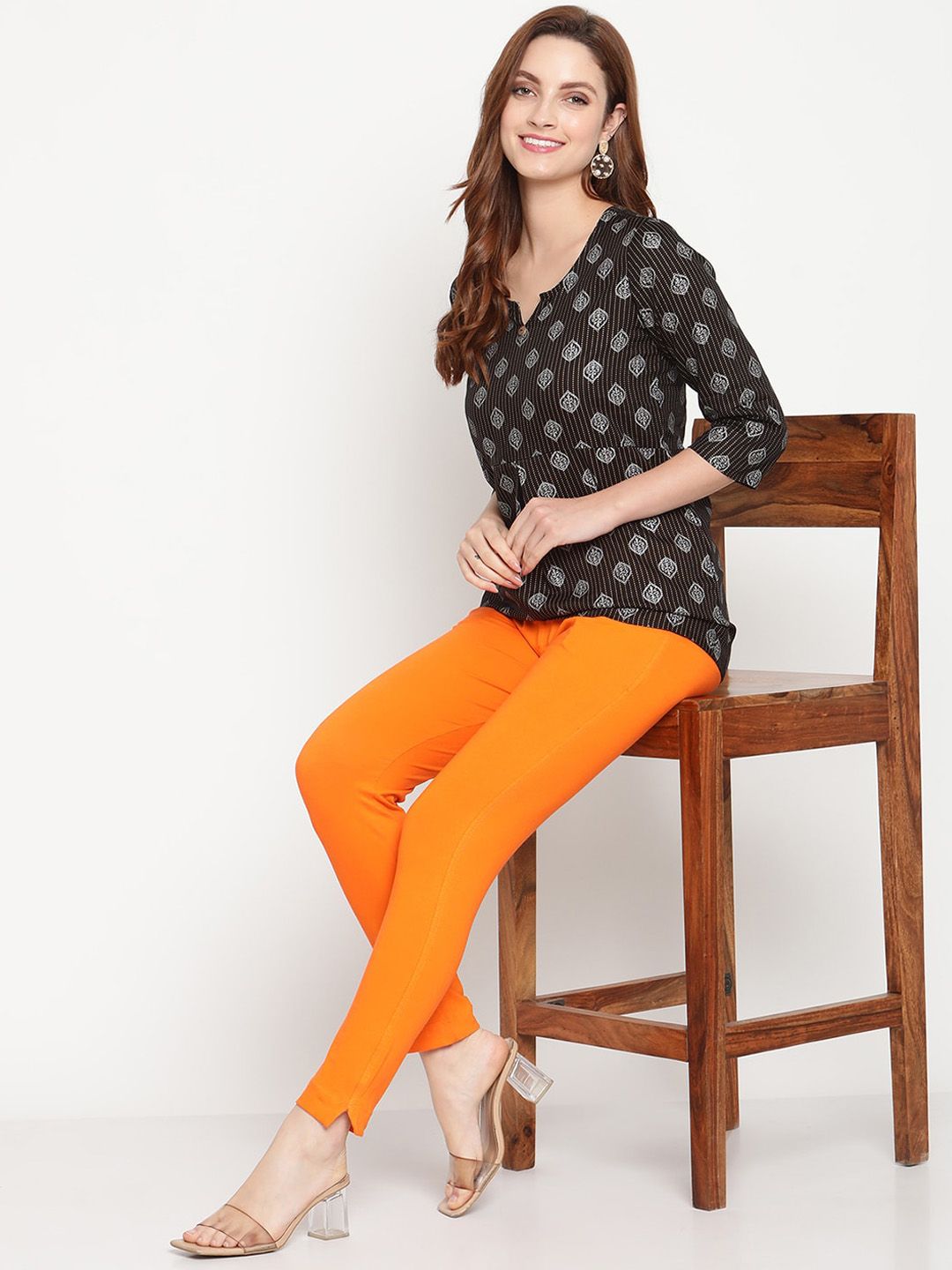 TAG 7 Women Orange Solid Leggings - Distacart