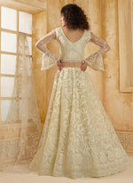 Thumbnail for Vegaa Fashion Off White Net Thread Work Wedding Lehenga