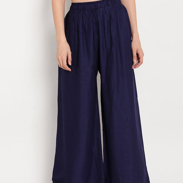 TAG 7 Women Navy Blue Solid Flared Palazzos - Distacart