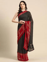 Thumbnail for https://cdn.shopify.com/s/files/1/0341/4805/7228/files/black-printed-georgette-saree-libas-1.jpg?v=1738938113
