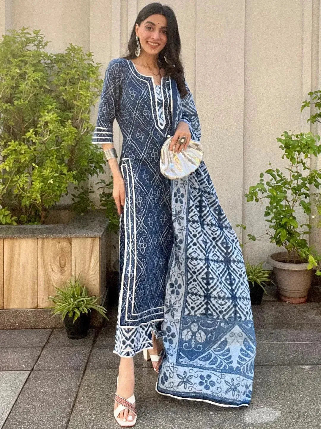 https://cdn.shopify.com/s/files/1/0341/4805/7228/files/blue-printed-cotton-straight-kurta-with-palazzos-and-dupatta-libas-1-27530881368214.jpg?v=1739541852